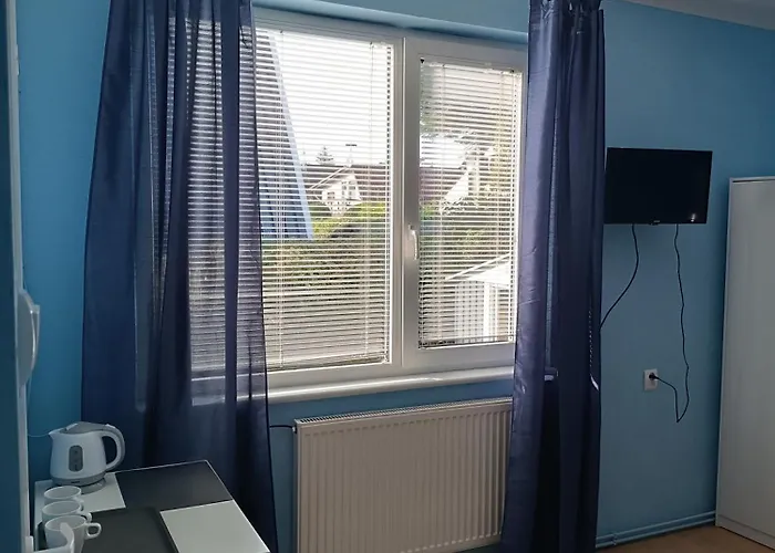 Quarto em Acomodações Particulares Familia